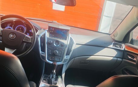 Cadillac SRX II рестайлинг, 2011 год, 990 000 рублей, 4 фотография
