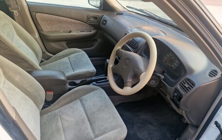 Nissan Sunny B15, 1998 год, 335 000 рублей, 15 фотография