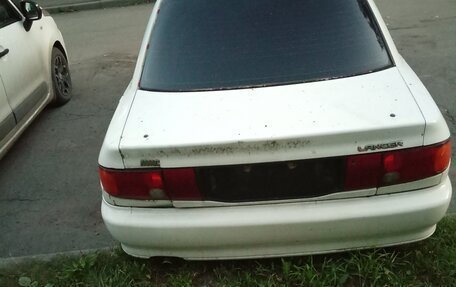 Mitsubishi Lancer VII, 1994 год, 65 000 рублей, 3 фотография
