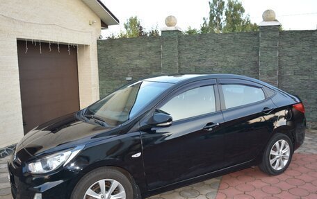 Hyundai Solaris II рестайлинг, 2012 год, 860 000 рублей, 2 фотография