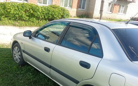 Mitsubishi Carisma I, 2003 год, 220 000 рублей, 3 фотография