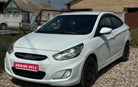 Hyundai Solaris II рестайлинг, 2012 год, 625 000 рублей, 2 фотография