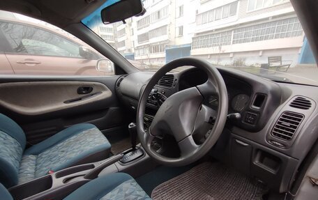 Mitsubishi Mirage VI рестайлинг, 1996 год, 160 000 рублей, 10 фотография