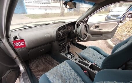 Mitsubishi Mirage VI рестайлинг, 1996 год, 160 000 рублей, 11 фотография