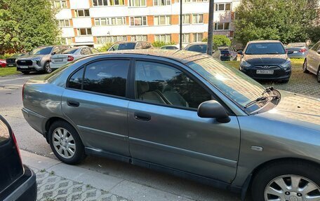 Mitsubishi Carisma I, 2003 год, 230 000 рублей, 3 фотография