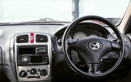 Mazda 323, 2003 год, 325 000 рублей, 18 фотография