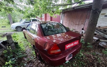 Mitsubishi Mirage VI рестайлинг, 1998 год, 60 000 рублей, 5 фотография
