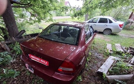 Mitsubishi Mirage VI рестайлинг, 1998 год, 60 000 рублей, 8 фотография