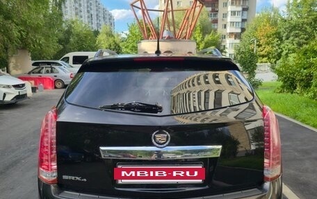 Cadillac SRX II рестайлинг, 2011 год, 750 000 рублей, 12 фотография