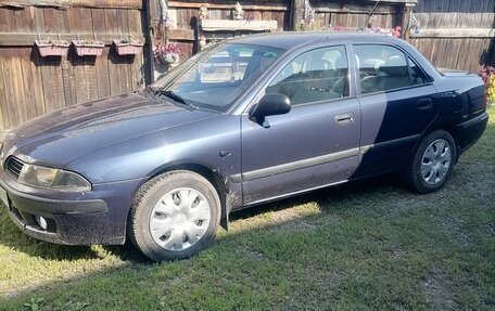 Mitsubishi Carisma I, 2001 год, 180 000 рублей, 10 фотография