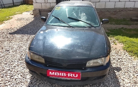 Mitsubishi Mirage VI рестайлинг, 1999 год, 130 000 рублей, 1 фотография