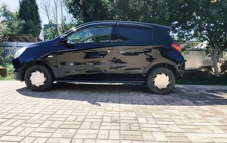 Mitsubishi Mirage VI рестайлинг, 2013 год, 700 000 рублей, 28 фотография