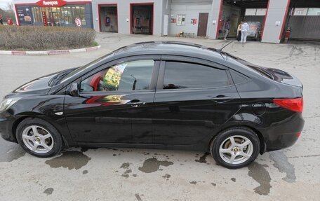 Hyundai Solaris II рестайлинг, 2011 год, 600 000 рублей, 4 фотография