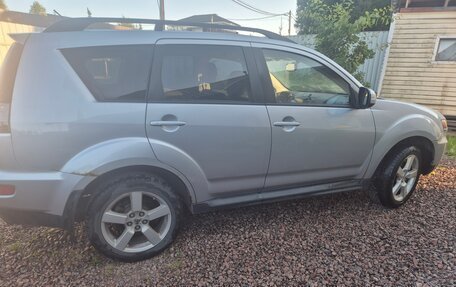 Mitsubishi Outlander III рестайлинг 3, 2011 год, 900 000 рублей, 3 фотография