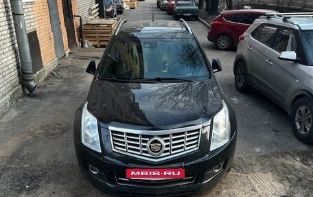 Cadillac SRX II рестайлинг, 2014 год, 1 750 000 рублей, 18 фотография