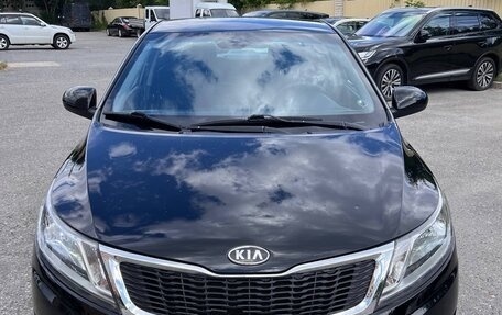 KIA Rio III рестайлинг, 2012 год, 620 000 рублей, 2 фотография