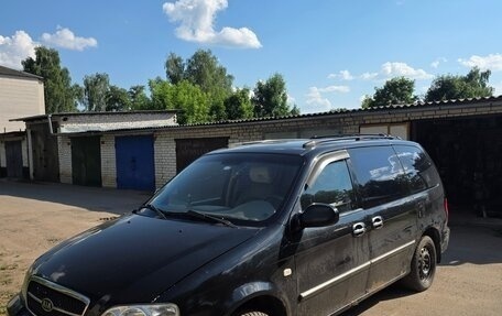 KIA Carnival III, 2004 год, 450 000 рублей, 3 фотография