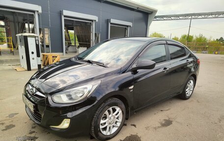 Hyundai Solaris II рестайлинг, 2011 год, 730 000 рублей, 4 фотография