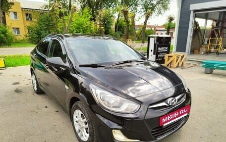 Hyundai Solaris II рестайлинг, 2011 год, 730 000 рублей, 2 фотография