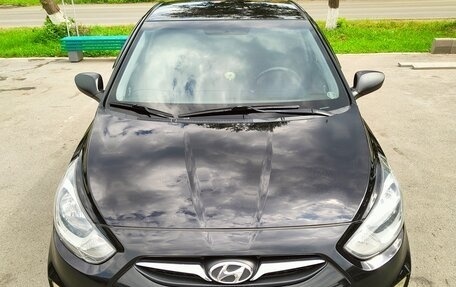 Hyundai Solaris II рестайлинг, 2011 год, 730 000 рублей, 3 фотография