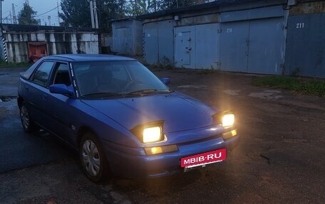 Mazda 323, 1990 год, 130 000 рублей, 3 фотография