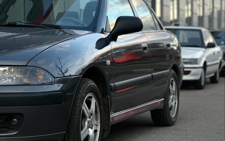 Mitsubishi Carisma I, 2002 год, 499 999 рублей, 24 фотография