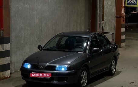 Mitsubishi Carisma I, 2002 год, 499 999 рублей, 27 фотография