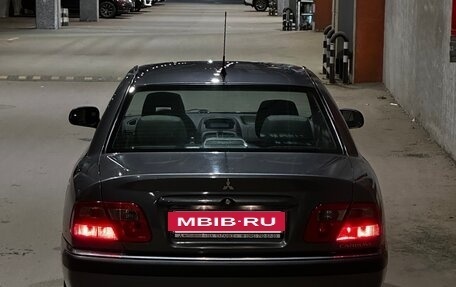 Mitsubishi Carisma I, 2002 год, 499 999 рублей, 26 фотография