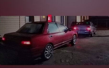 Daihatsu Applause I рестайлинг, 1989 год, 90 000 рублей, 22 фотография