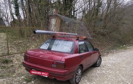 Daihatsu Applause I рестайлинг, 1989 год, 90 000 рублей, 21 фотография