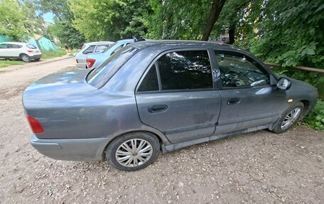 Mitsubishi Carisma I, 2003 год, 188 000 рублей, 1 фотография