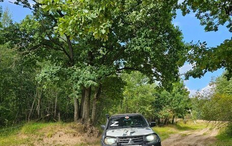 Mitsubishi L200 IV рестайлинг, 2011 год, 1 799 000 рублей, 4 фотография