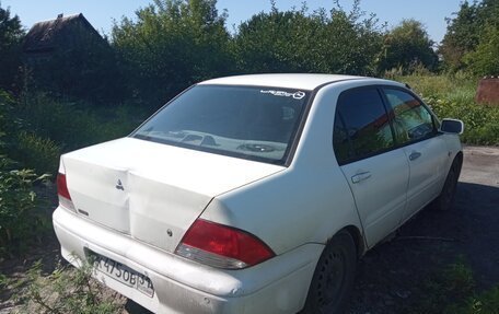 Mitsubishi Lancer IX, 2002 год, 169 000 рублей, 4 фотография