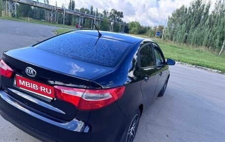 KIA Rio III рестайлинг, 2014 год, 730 000 рублей, 9 фотография