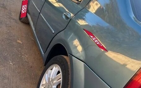 Renault Logan I, 2011 год, 395 000 рублей, 10 фотография