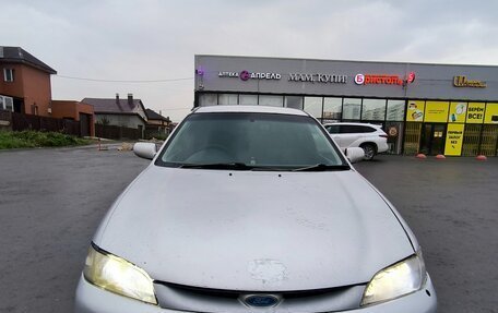Ford Laser IV, 1996 год, 115 000 рублей, 1 фотография