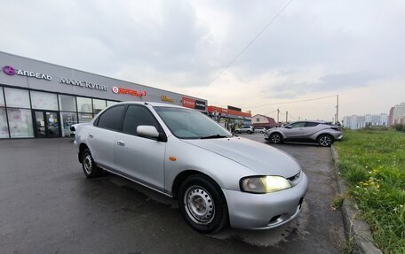Ford Laser IV, 1996 год, 115 000 рублей, 3 фотография