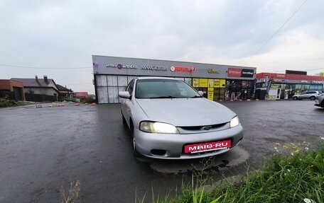 Ford Laser IV, 1996 год, 115 000 рублей, 2 фотография