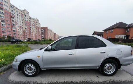 Ford Laser IV, 1996 год, 115 000 рублей, 9 фотография