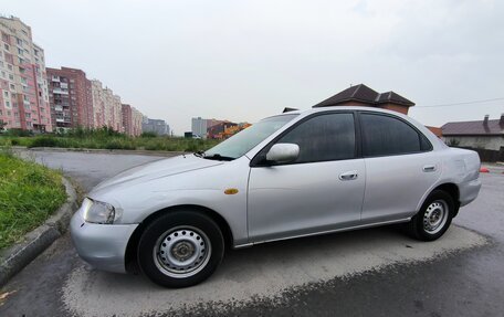 Ford Laser IV, 1996 год, 115 000 рублей, 10 фотография