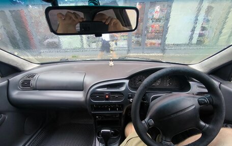 Ford Laser IV, 1996 год, 115 000 рублей, 12 фотография