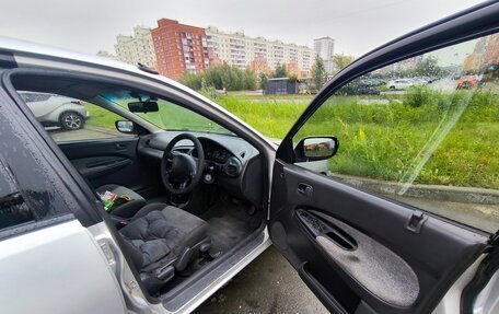 Ford Laser IV, 1996 год, 115 000 рублей, 13 фотография