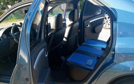 Renault Logan I, 2011 год, 600 000 рублей, 8 фотография