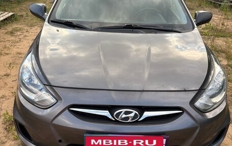 Hyundai Solaris II рестайлинг, 2011 год, 700 000 рублей, 14 фотография