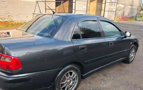 Mitsubishi Carisma I, 2002 год, 220 000 рублей, 3 фотография