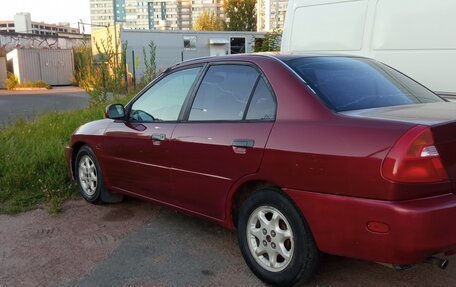 Mitsubishi Mirage VI рестайлинг, 1995 год, 149 999 рублей, 5 фотография