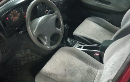 Mitsubishi Mirage VI рестайлинг, 1995 год, 149 999 рублей, 13 фотография