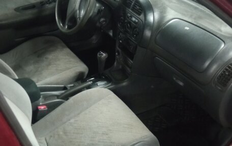 Mitsubishi Mirage VI рестайлинг, 1995 год, 149 999 рублей, 9 фотография