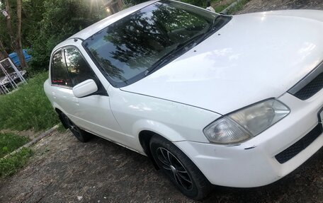 Mazda Familia, 1999 год, 200 000 рублей, 8 фотография
