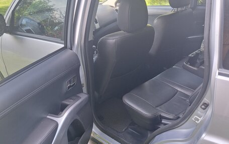 Mitsubishi Outlander III рестайлинг 3, 2011 год, 1 250 000 рублей, 21 фотография